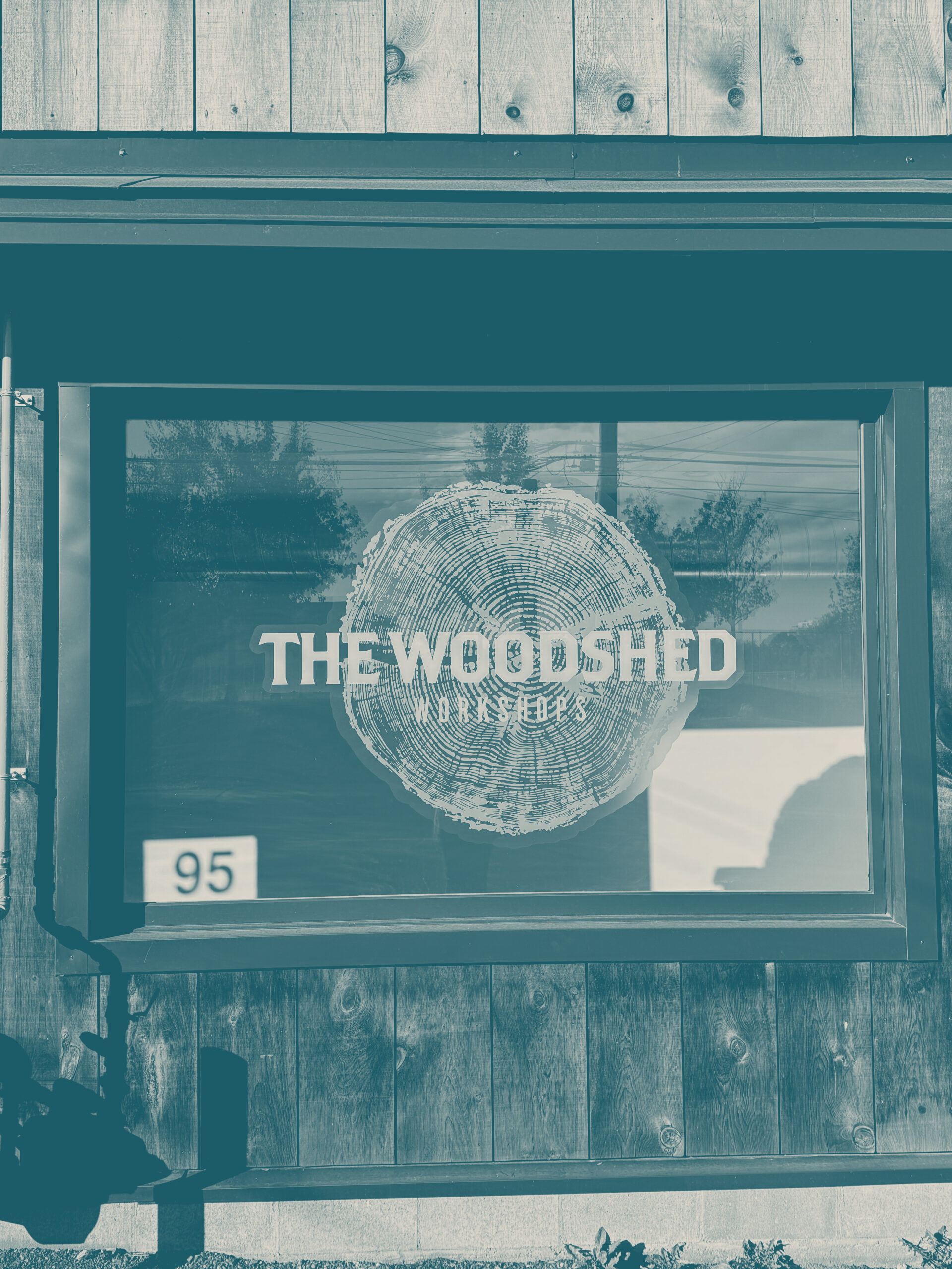 Front window with The Woodshed Logo